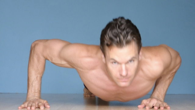 Male Athlete Performs Modified Lateral And Regular  Pushups