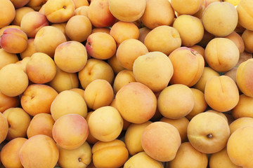 Many Peaches at a Market