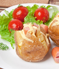 baked potato with sausages and salad 
