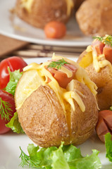 baked potato with sausages and salad 