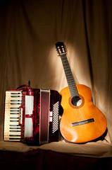 Naklejka premium Retro accordion and acoustic guitar
