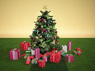 Christmass tree with several gifts, on a green carpet.