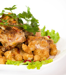 Roasted rabbit and vegetable garnish
