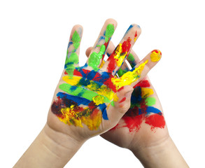 Boy hands painted with colorful paint