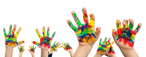 Boy hands painted with colorful paint