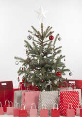 Decorated Christmas tree on white background