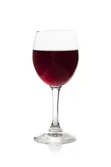 Fotobehang Elegant red wine glass isoolated on a white background © StockPhotosArt