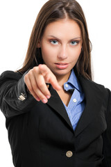Businesswoman pointing her finger at you. Isolated on white