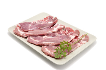 raw pork chops with parsley
