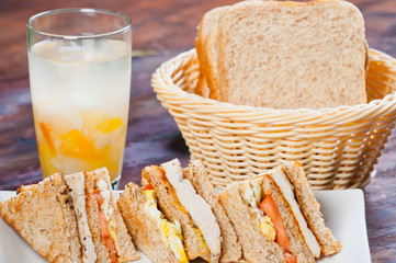 double layered chicken club house sandwich with melted cheese