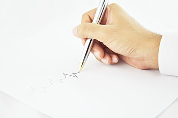 Hand writing pulse line in white paper