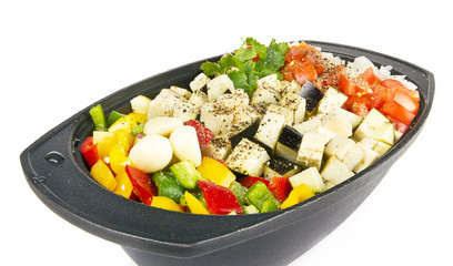 Fresh vegetables mix ready to be cooked on white background