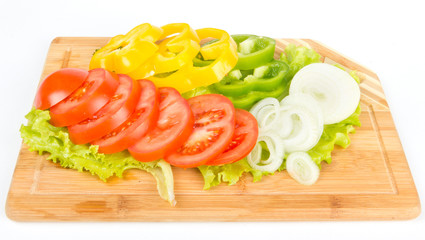 Fresh vegetable mix sliced on white background