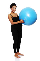 Pregnant woman exercises