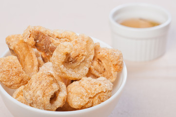 crispy fried pork fat also known as chicharon (philippines)