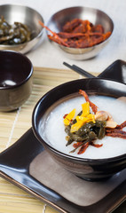 congee with dried beef, peanuts, preserve turnips and sea weeds