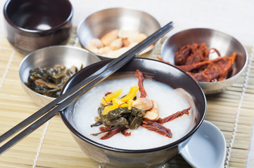 congee with dried beef, peanuts, preserve turnips and sea weeds
