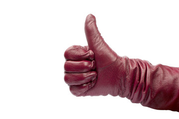 Closeup of hand in red glove showing thumbs up