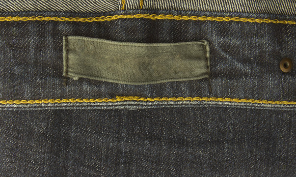 fabric jeans label sewed on a blue jeans.