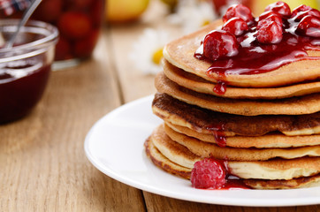 Delicious pancakes with raspberries