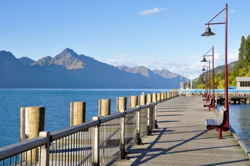 Tuinposter Wooden promenade at Queenstown, New Zealand © Noradoa