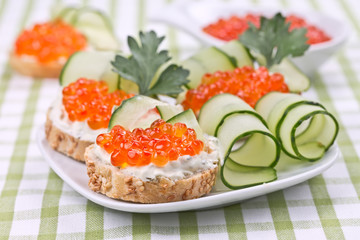 Sandwiches with red caviar