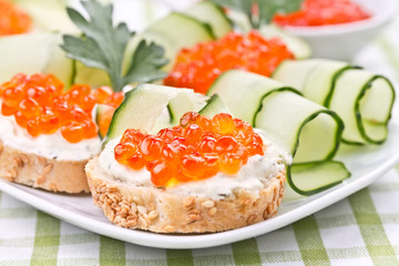 Sandwiches with red caviar