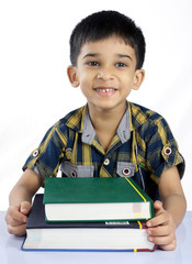 Indian Little Boy with Textbooks