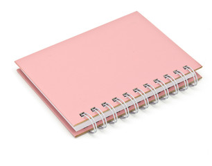 stack of ring binder book or pink notebook