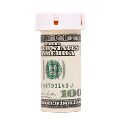 bottle pills wrapped in money isolated on white