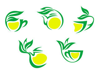 Tea cups symbols with lemon and green leaves