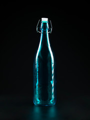 transparent blue bottle