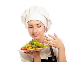 Pretty cook chief holding salad