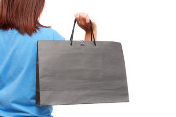 Female hand holding shopping bag