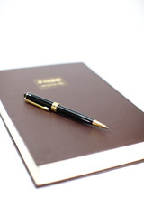 Book with a pen