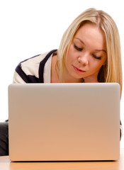 Young woman concentrating on her laptop