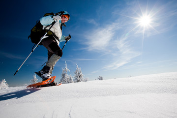 Hiker in winter mountains