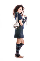 beautiful girl with figure skates, insulated background