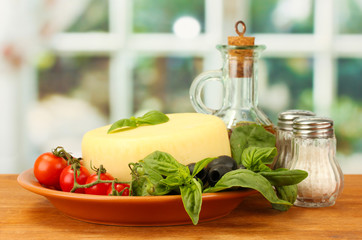 cheese mozzarella with vegetables in the plate