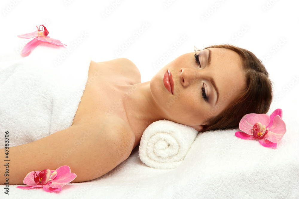 Wall mural beautiful young woman in spa salon, isolated on white