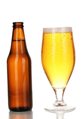 Bottle and glass of beer isolated on white