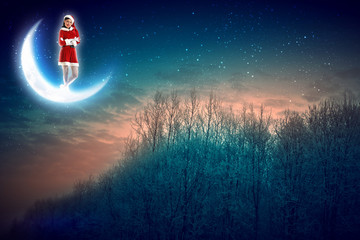 photo of santa claus sitting on the moon