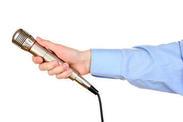 Male hand with microphone isolated on white