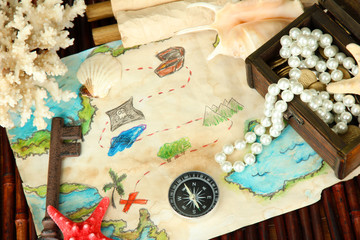 map of treasures on dark wooden background