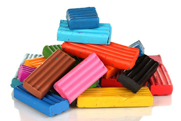 Children bright plasticine isolated on white