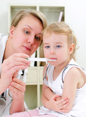 Cute little girl visiting pediatrician