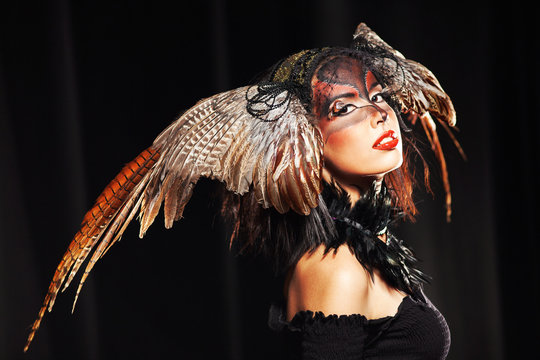 pheasant fantasy hat on beauty head with make-up