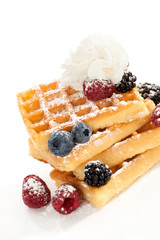 Waffle with berries and cream.