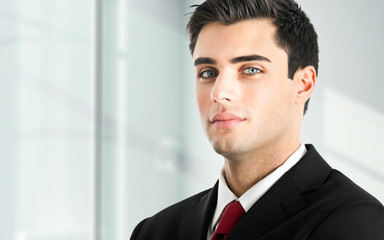 Handsome businessman with blue eyes