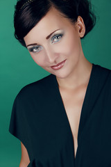 Close-up portrait of elegant Caucasian woman with beautiful blue